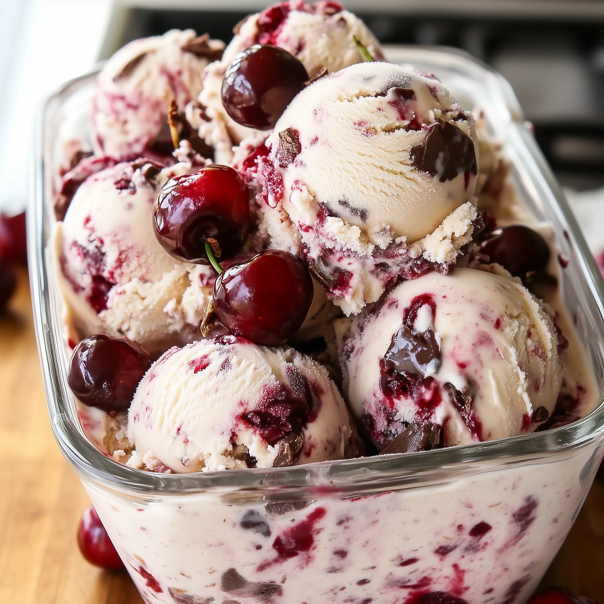 No churn cherry ice cream in a bowl, highlighting the rich flavors of Black Forest with cherries.