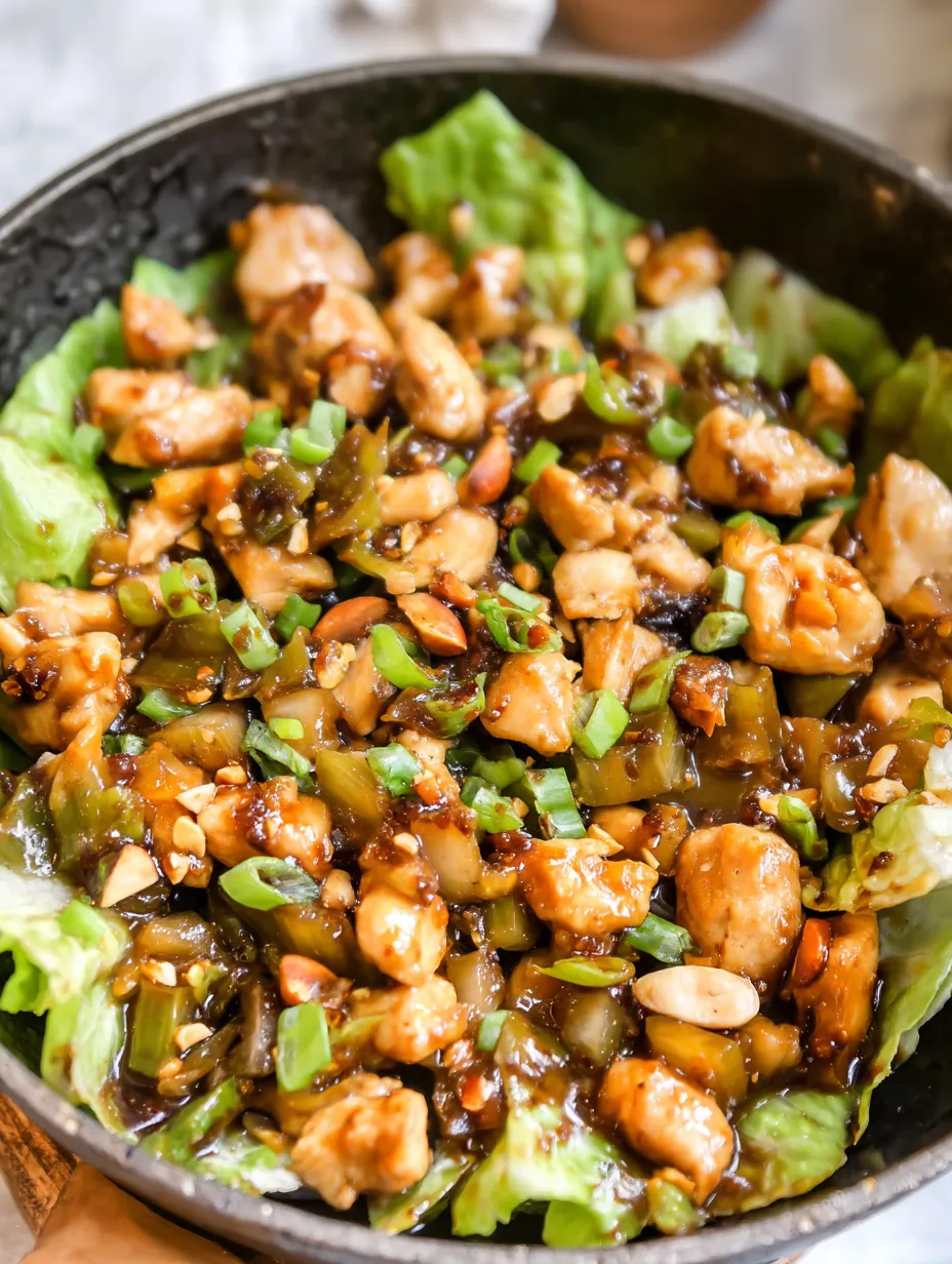 A bowl of chicken and vegetables.