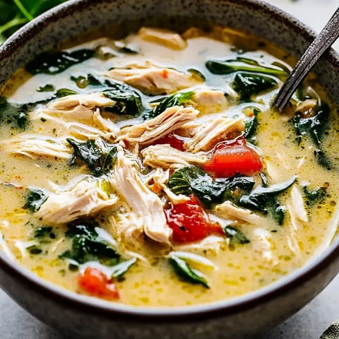 A creamy chicken soup filled with bacon, spinach, and tender shredded chicken.