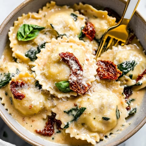 Ravioli in creamy sauce with spinach
